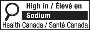 This figure shows a nutrition symbol for the principal display panel that indicates that a prepackaged product is high in sodium. This symbol is bilingual, with the English text shown first, followed by the French text. There is a white rectangular box outlined by a thin black line. At the top left of the box is a black magnifying glass. To the right of the magnifying glass is a heading composed of the words “High in” followed by a forward slash and the words “Élevé en” in black, bold, lower case letters, except that the first letter of the words “High” and “Élevé” are in upper case. Under the heading is one horizontal bar. There is a small amount of white space between the right side of the bar and the thin black line that outlines the box. The bar is black and contains the word “Sodium” in white, bold, lower case letters, except that the first letter is in upper case. Centred at the bottom of the box are the words “Health Canada” followed by a forward slash and the words “Santé Canada” in black, lower case letters, except that the first letter of each word is in upper case.